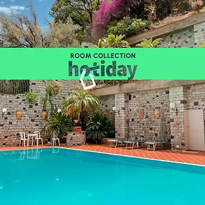 hotiday-room-collection.taorminaitalyhotels.com/